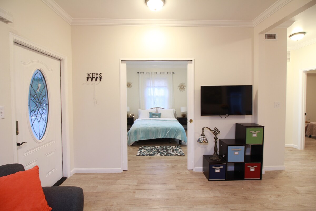 Master BR with sliding door. additional slide-out twin bed is under the queen bed