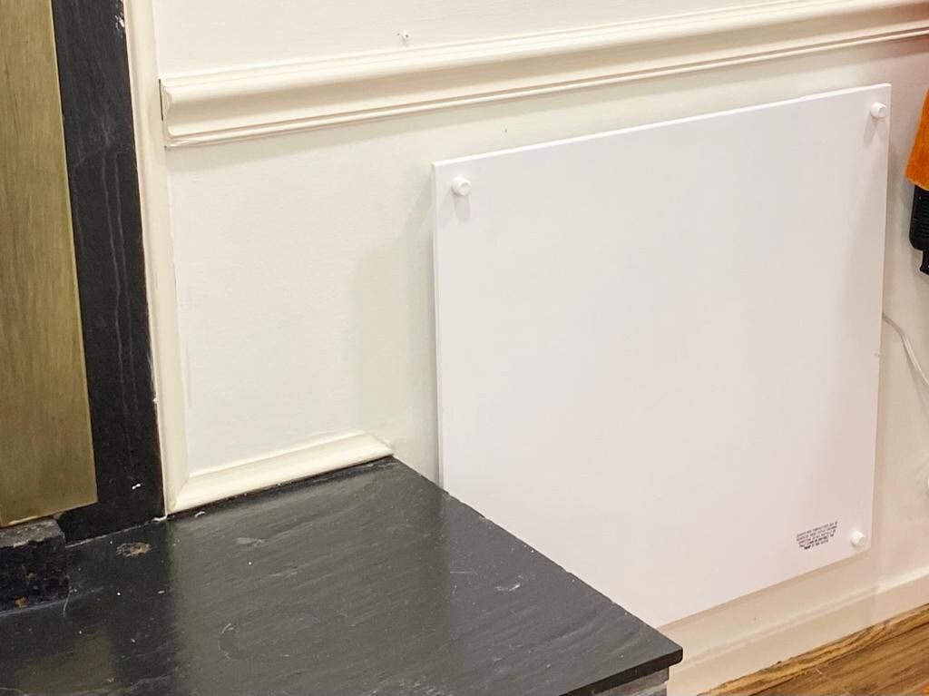 Wall ceramic heater. Switch on the side. 